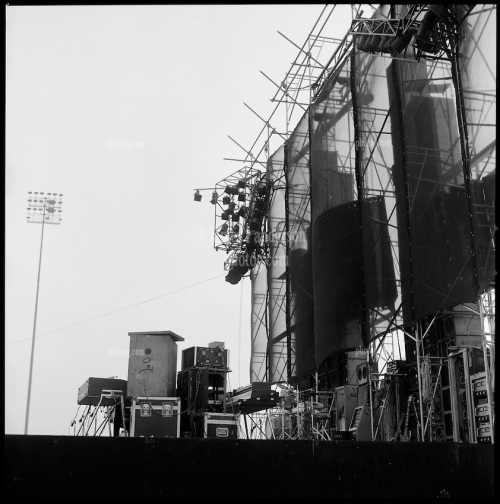 The Grateful Dead Concert at Dillon Stadium on 31 July 1974. B&W Original Film Scan. Photograph taken with a Hasselblad Camera with Tri-X film. View of the Stage, Gear and the Wall of Sound.